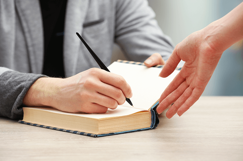 Standing By the Pen: A Guide to Championing Loved One at Their Book Signing